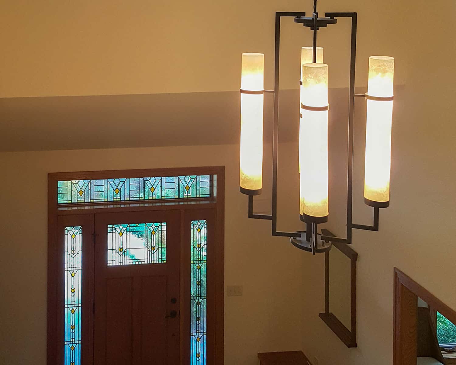 Lemel Homes New Construction - Craftsman - chandelier in a foyer detail