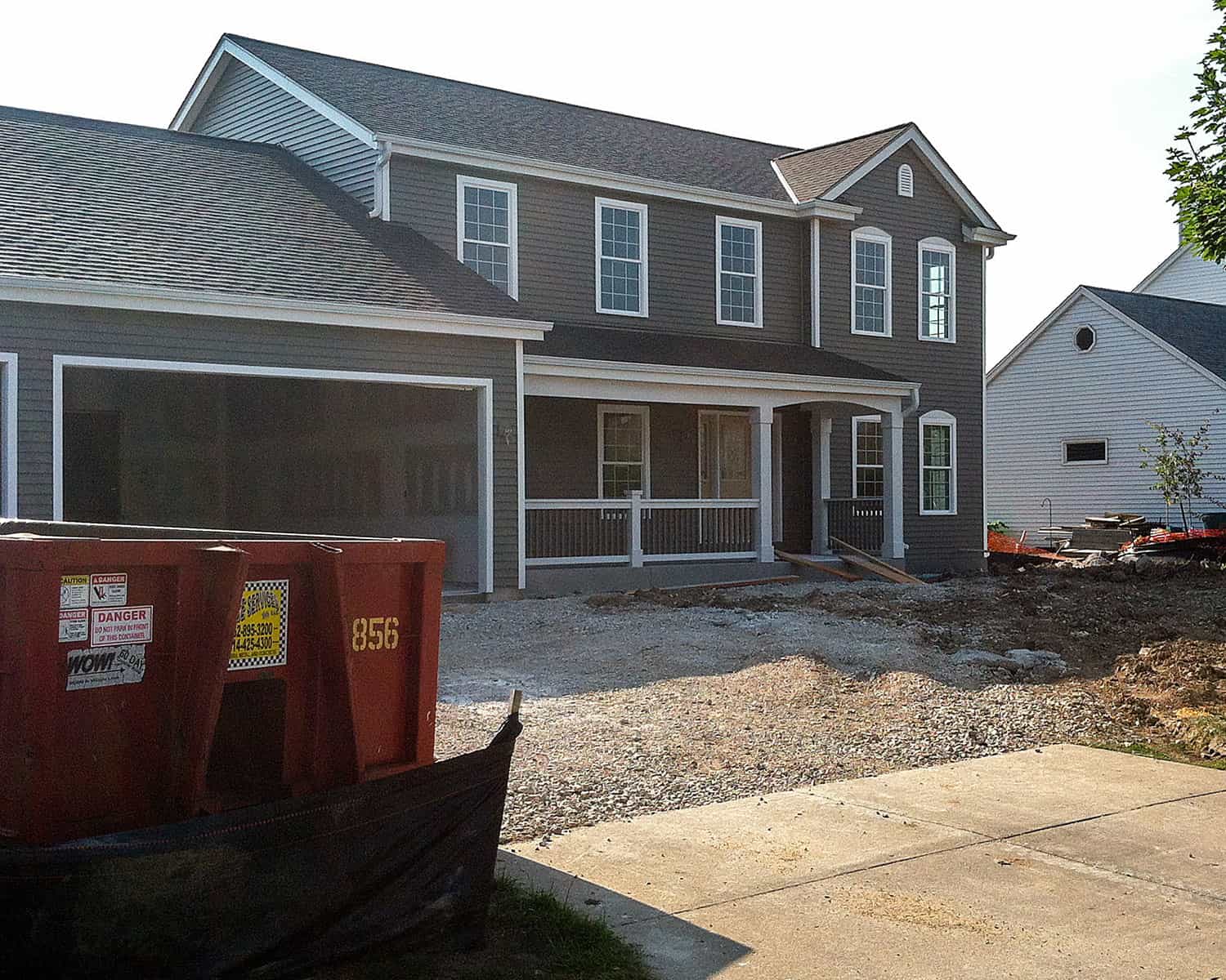 Lemel Homes Teardown, Rebuild, & Infill - Fire Rebuild - 2 story gray house near completion