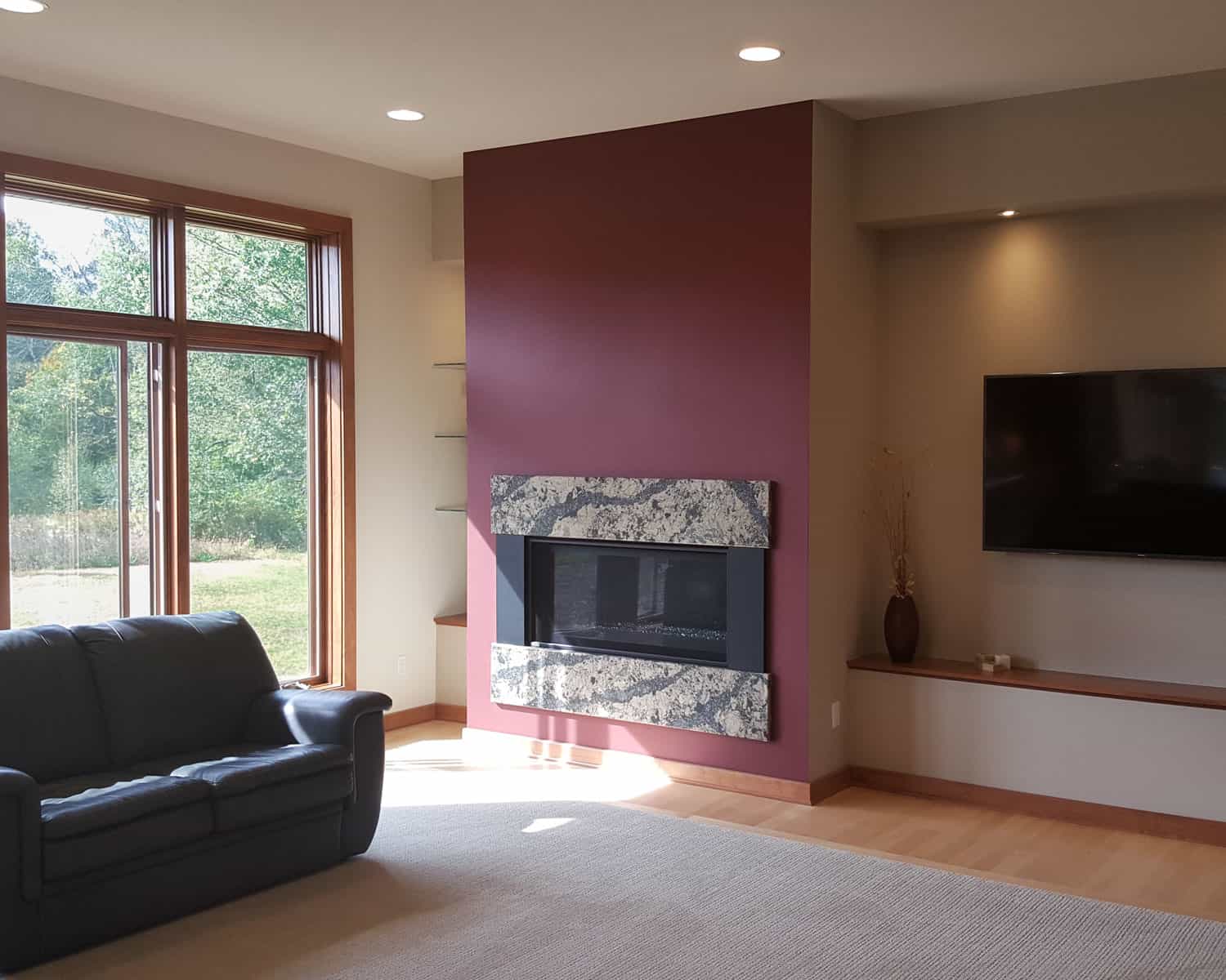 Lemel Homes - New Construction - Ranch - 3 - modern gas fireplace with a flat screen TV